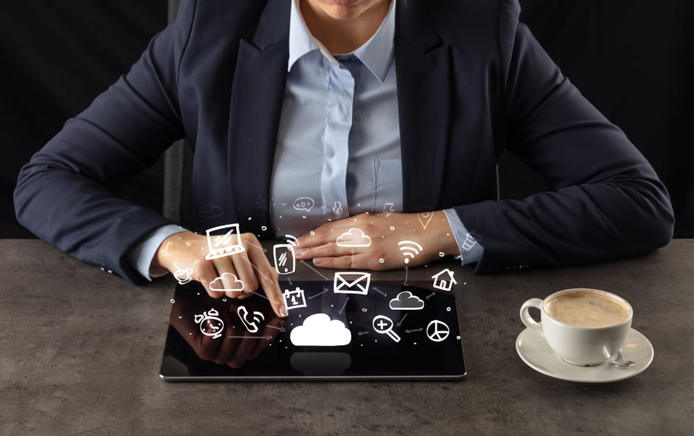 Business woman working on tablet with application and cloud technology concept Business woman working on tablet with application and cloud technology concept